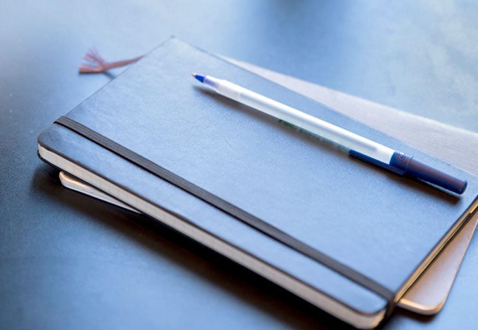 Services-ContentWriting-692-479-1 stack of notebooks and pens in Bozeman, MT